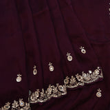 Wine Hand Embroidered Georgette Saree With Mirror Work Border