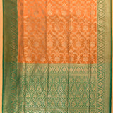Peach Orange Silver Zari Ogee Floral All Over Pure Silk Banarasi Saree With Contrast Emerald Green Arch Pallu