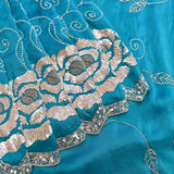 Teal Saree With Pearl Swirl Embroidery And Sequin Rose Motif