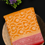 Mustard Yellow & Red Banarasi Saree With Silver Zari Floral Weave