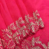 Rani Pink Organza Saree With Hand Embroidered Leaf Motif Border And Stone Work