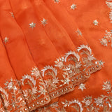 Red-Orange Shaded Organza Saree With Hand Embroidered Lotus Booti And Floral Border