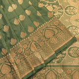 Moss Green Copper Zari Floral Butti Pure Silk Banarasi Saree With Heavy Woven Border
