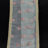 Mint Green Organza Saree With Multicolour Floral Butti & Heavy Gold Zardozi Embroidered Border
