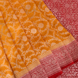 Mustard Yellow & Red Banarasi Saree With Silver Zari Floral Weave