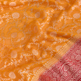 Mustard Yellow & Red Banarasi Saree With Silver Zari Floral Weave