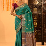Teal Green With Gold Zari Butti And Bronze Woven Pallu Kanjivaram Silk Saree