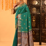 Teal Green With Gold Zari Butti And Bronze Woven Pallu Kanjivaram Silk Saree