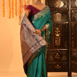 Teal Green With Gold Zari Butti And Bronze Woven Pallu Kanjivaram Silk Saree