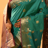 Teal Green With Gold Zari Butti And Bronze Woven Pallu Kanjivaram Silk Saree
