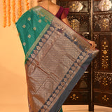 Teal Green With Gold Zari Butti And Bronze Woven Pallu Kanjivaram Silk Saree