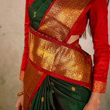 Dark Green Kanjivaram Silk Saree With Red Contrast Border & Gold Zari Buttas