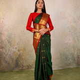 Dark Green Kanjivaram Silk Saree With Red Contrast Border & Gold Zari Buttas