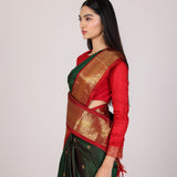Dark Green Kanjivaram Silk Saree With Red Contrast Border & Gold Zari Buttas