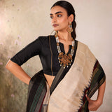 Cream Woven Tussar Silk Saree With Contrast Black Temple Border