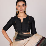 Cream Woven Tussar Silk Saree With Contrast Black Temple Border