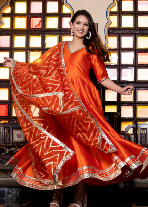 <img> Tiger Orange Taffeta Silk Anarkali Set With Zari Woven Dupatta