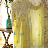 Yellow Block Printed V-Neckline Cotton Kurta Set With Floral Design