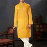 Turmeric Yellow Cotton Kurta Set With Embroidered Neck