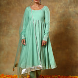 Sage Green Anarkali Set With Silver Striped Border And Net Dupatta