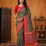 Emerald Green Floral Jaal Patola Silk Saree With Red Border