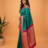 Teal Green and Rani Pink Border Kanjivaram Silk Saree with Golden Zari