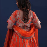 Orange Raw Silk Lehenga Set With Netted Dupatta
