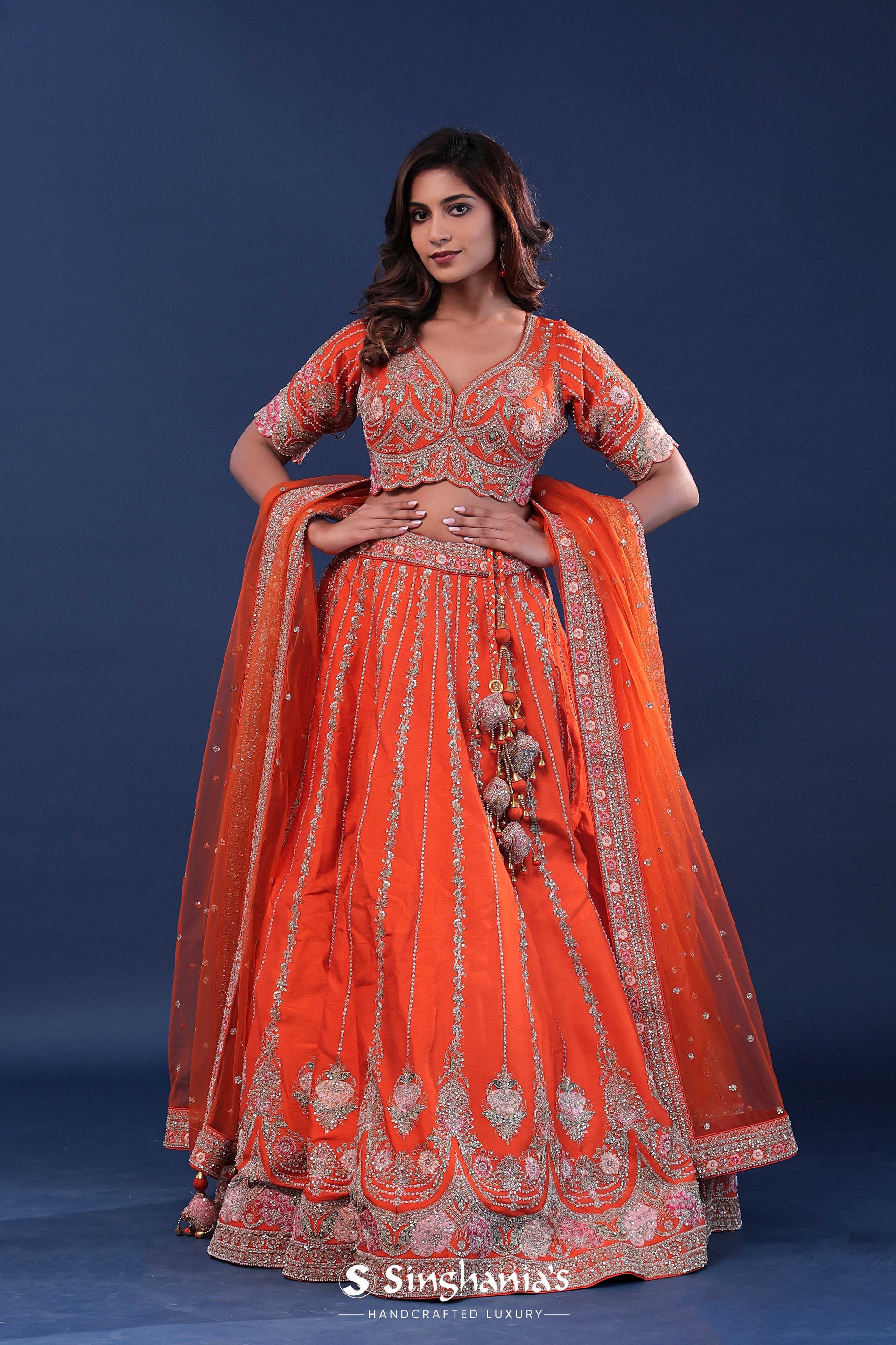 <img> Orange Raw Silk Lehenga Set With Netted Dupatta