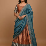 Teal & Rust Silk Lehenga Set - Floral Embroidered Blouse With Metallic Sleeves & Border Highlight Dupatta