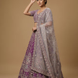 Deep Purple Silk Bridal Lehenga Choli With Embroidered Geometric Jaal & Gold Border Dupatta