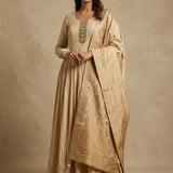 Beige Silk Anarkali Set With Butti Design And Woven Border Highlight