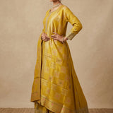 Mustard Yellow Silk Anarkali Set With All Over Design And Weaving Work