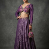 Deep Purple Crepe Lehenga Choli With Embroidered Floral Bustier & Striped Skirt