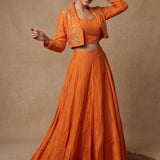 Burnt Orange Lehenga With Embellished Crop Top And Embroidered Blazer Jacket