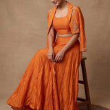Burnt Orange Lehenga With Embellished Crop Top And Embroidered Blazer Jacket