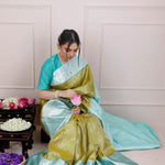 Olive Green Kanjivaram Silk Saree With Mayil Chakra And Floral Weaving