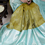 Olive Green Kanjivaram Silk Saree With Mayil Chakra And Floral Weaving