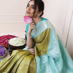 Olive Green Kanjivaram Silk Saree With Mayil Chakra And Floral Weaving