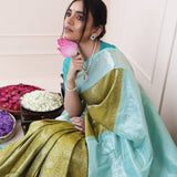 Olive Green Kanjivaram Silk Saree With Mayil Chakra And Floral Weaving