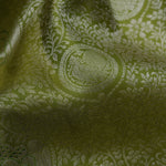 Olive Green Kanjivaram Silk Saree With Mayil Chakra And Floral Weaving