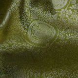 Olive Green Kanjivaram Silk Saree With Mayil Chakra And Floral Weaving