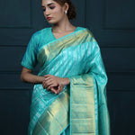Bright Turquoise Blue Kanjivaram Silk With Floral-Stripes Weaving