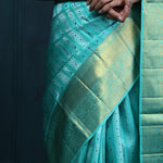 Bright Turquoise Blue Kanjivaram Silk With Floral-Stripes Weaving