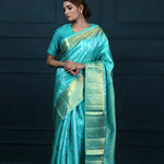 Bright Turquoise Blue Kanjivaram Silk With Floral-Stripes Weaving