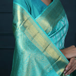 Bright Turquoise Blue Kanjivaram Silk With Floral-Stripes Weaving